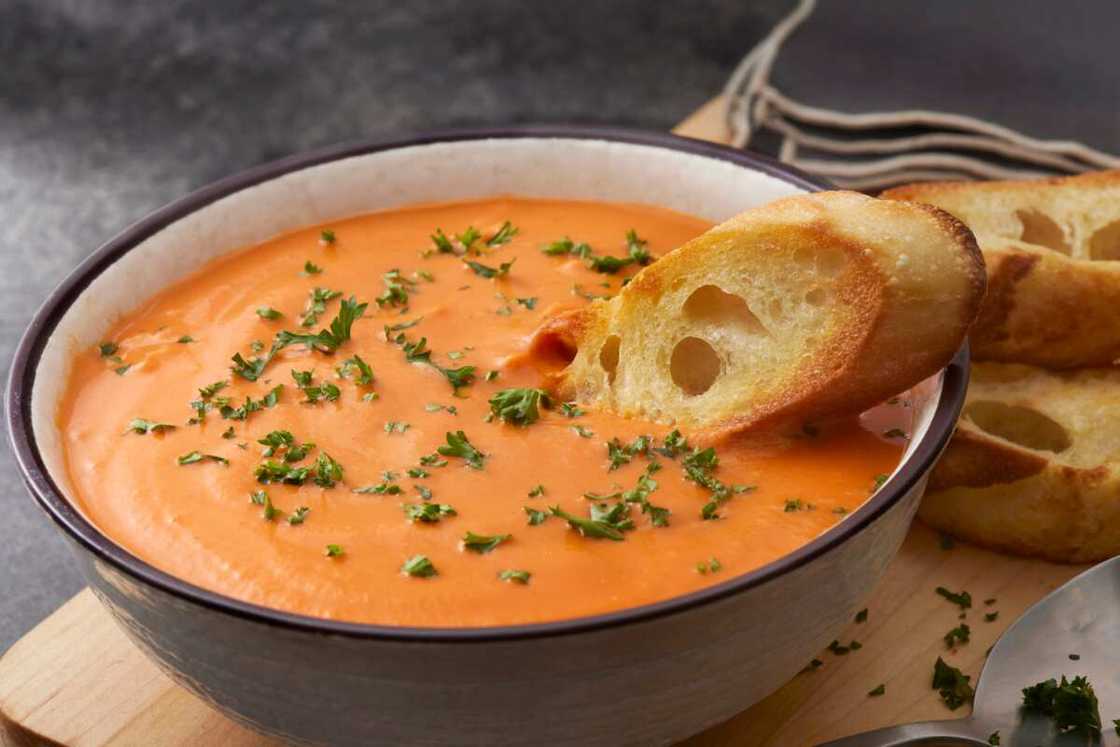 A bowl of thick orange soup