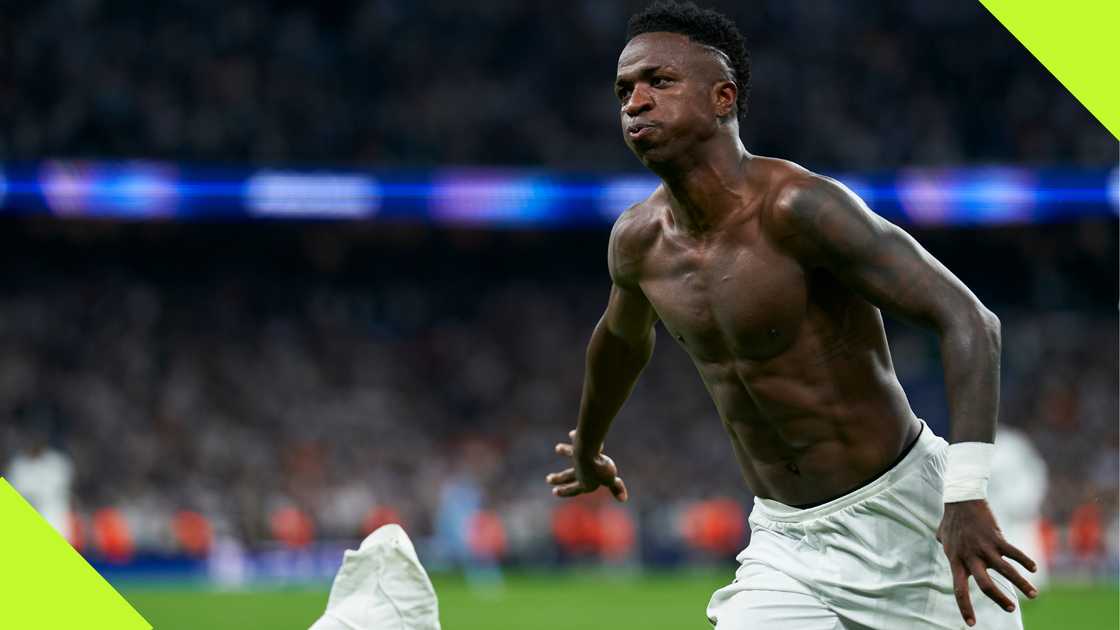 Vinicius Junior wheels away in celebration after completing his hat-trick against Borussia Dortmund in the Champions League. Photo by Mateo Villalba.