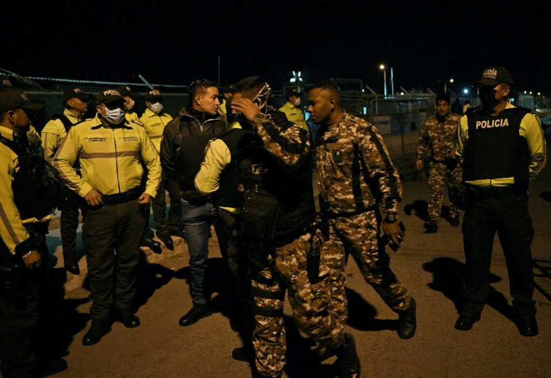 Guards leave the facility after clashes between inmates