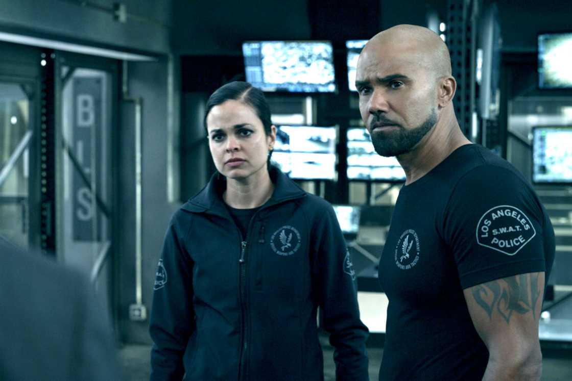 Lina Esco as Christina Chris Alonso and Shemar Moore as Daniel Hondo Harrelson on set of S.W.A.T. Lina Esco as Christina Chris Alonso and Shemar Moore as Daniel Hondo Harrelson on set of S.W.A.T.