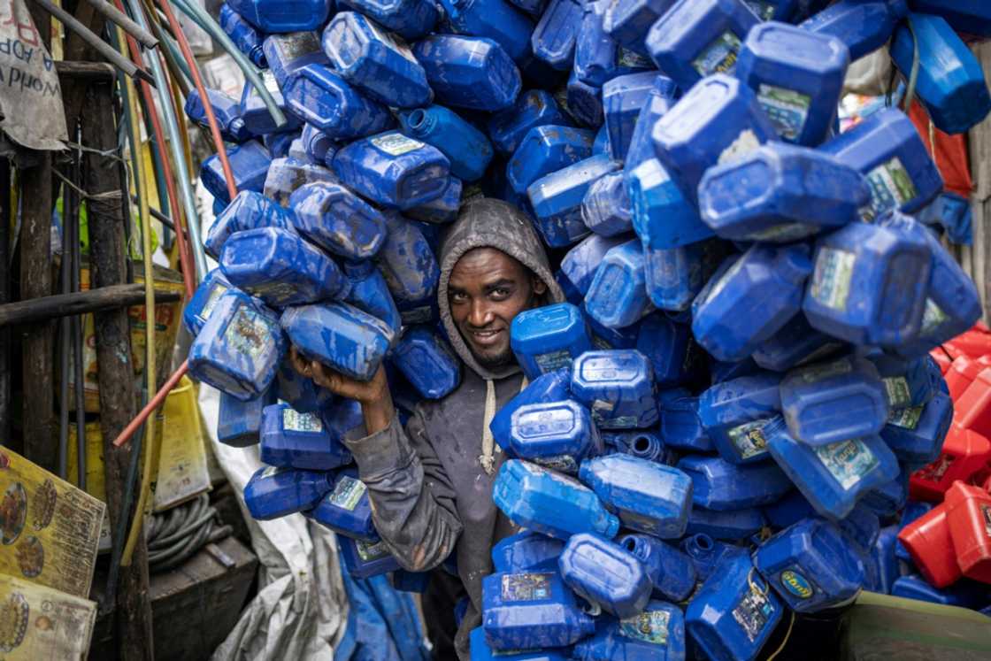 Ezedin Muste, 23, is one of thousands of waste collectors known in Amharic as 'korale'