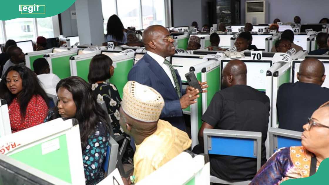 A trainer speaks to participants at a training centre