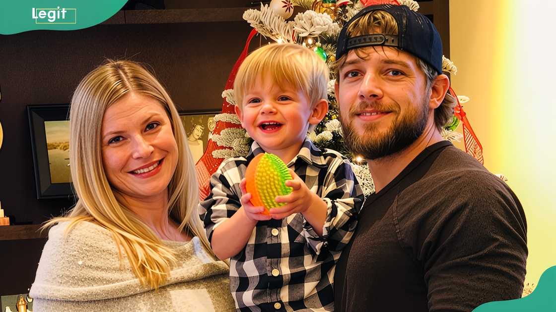 Lexi Murphy and Max posing with their son, Beaux