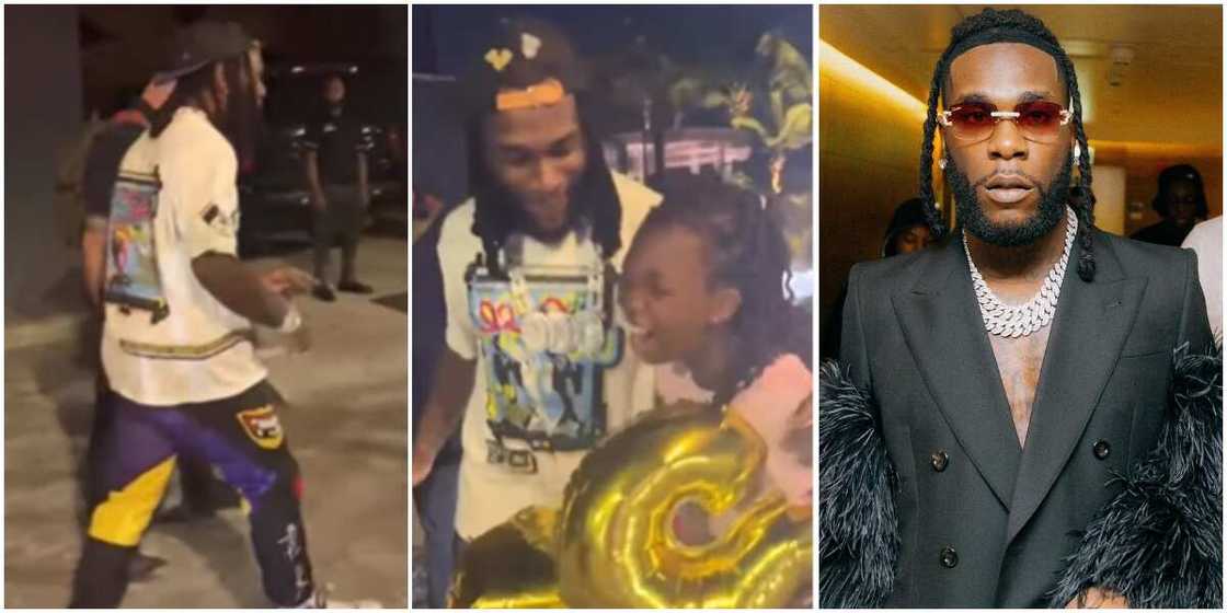 Burna Boy and fan. Burna Boy and fan.