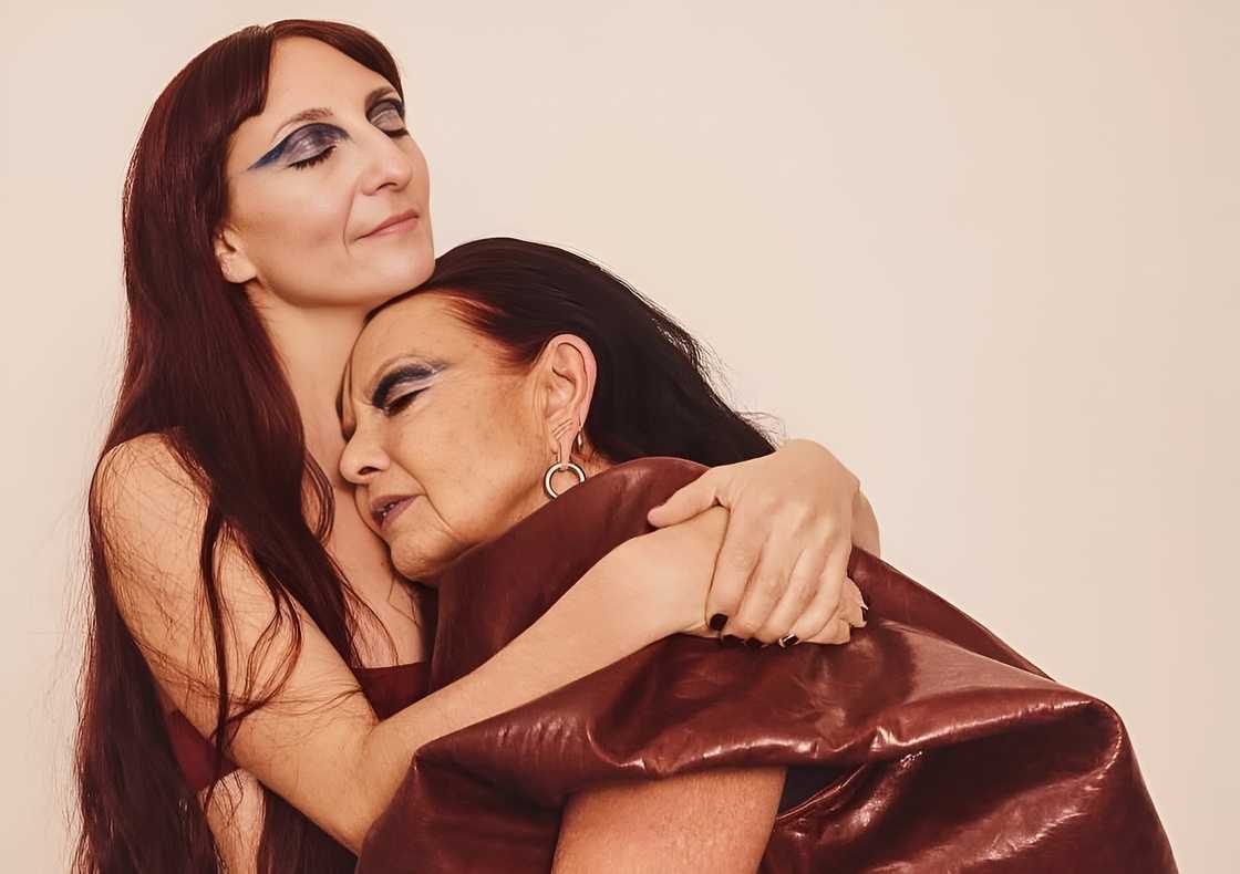 Scarlett Rouge holds her mother, Michèle Lamy during a photoshoot Scarlett Rouge holds her mother, Michèle Lamy during a photoshoot