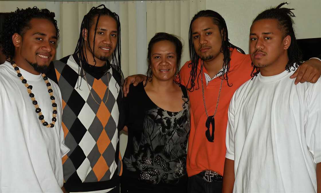 Talisua Fuavai-Fatu, (C) poses with her sons. Photo