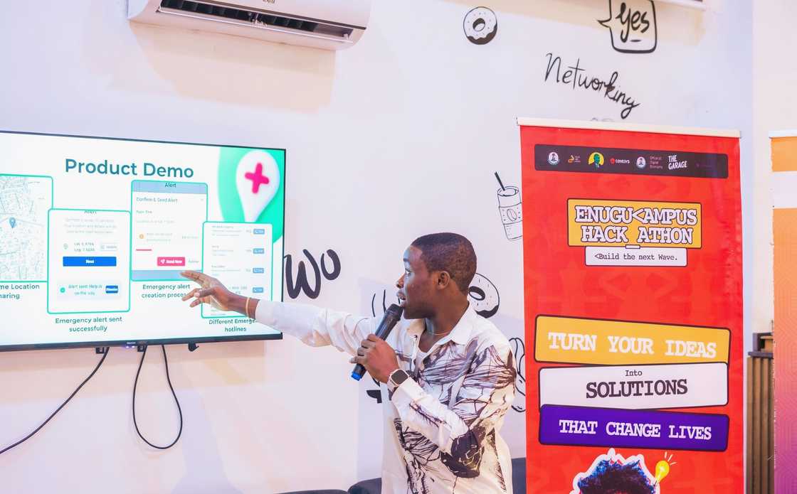 A developer presents a product demo during the Enugu Campus Hackathon