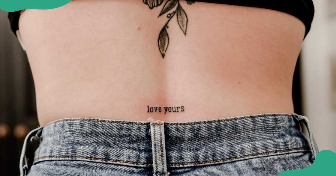 Love Yourz tattoos on the lower back