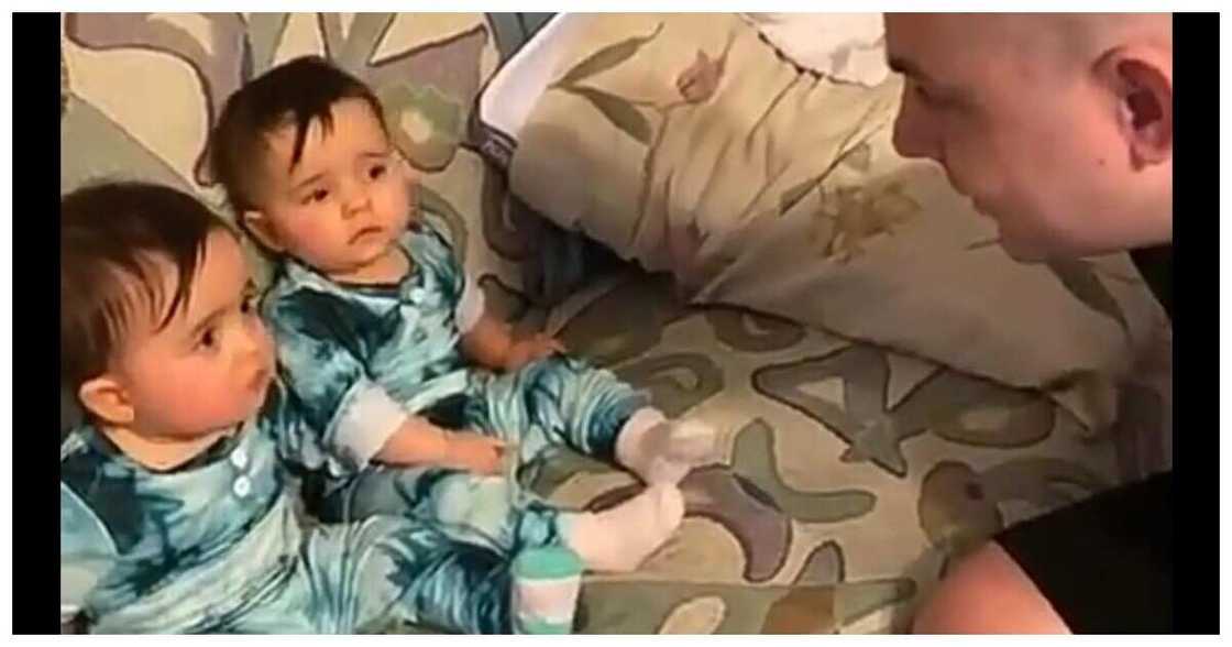 Twin babies light up the internet with their reactions on seeing their father's shaved head Twin babies light up the internet with their reactions on seeing their father's shaved head