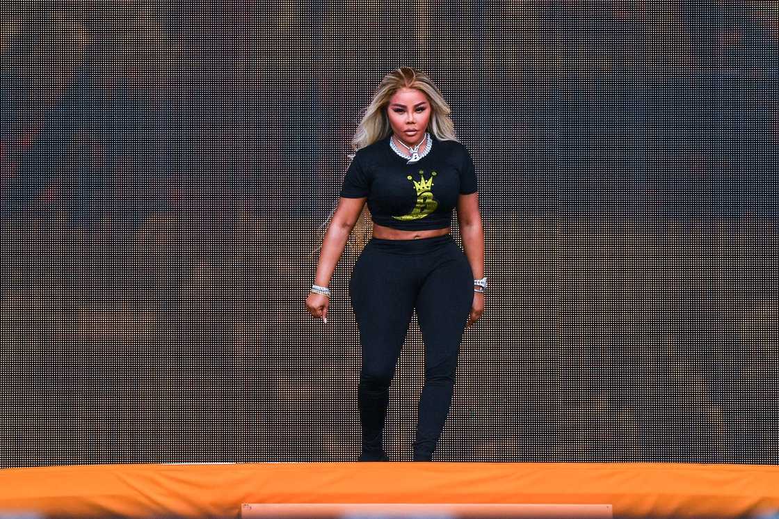 Lil' Kim performs onstage during the Lovers & Friends music festival