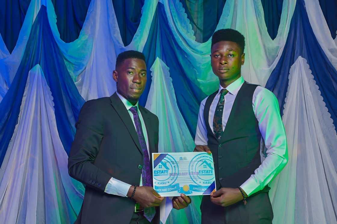 A student receives an estate management certificate A student receives an estate management certificate
