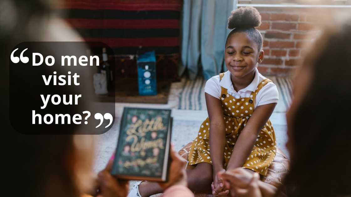 A young woman listens to adults indoors. A young woman listens to adults indoors.