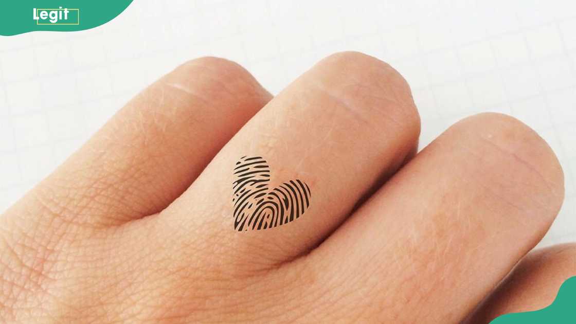 Fingerprint hearts tattoo Fingerprint hearts tattoo