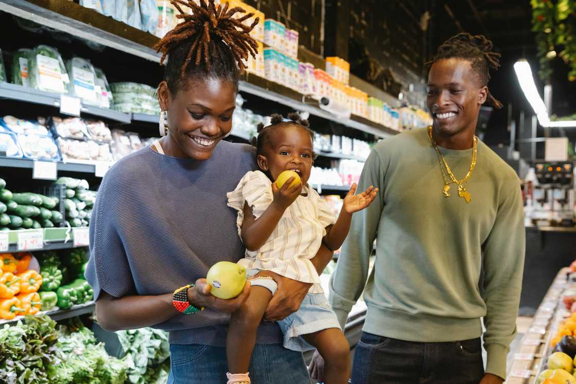 A mother, father, and daughter