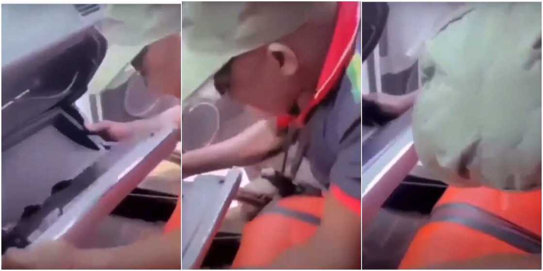The policeman struggled with the glove compartment The policeman struggled with the glove compartment