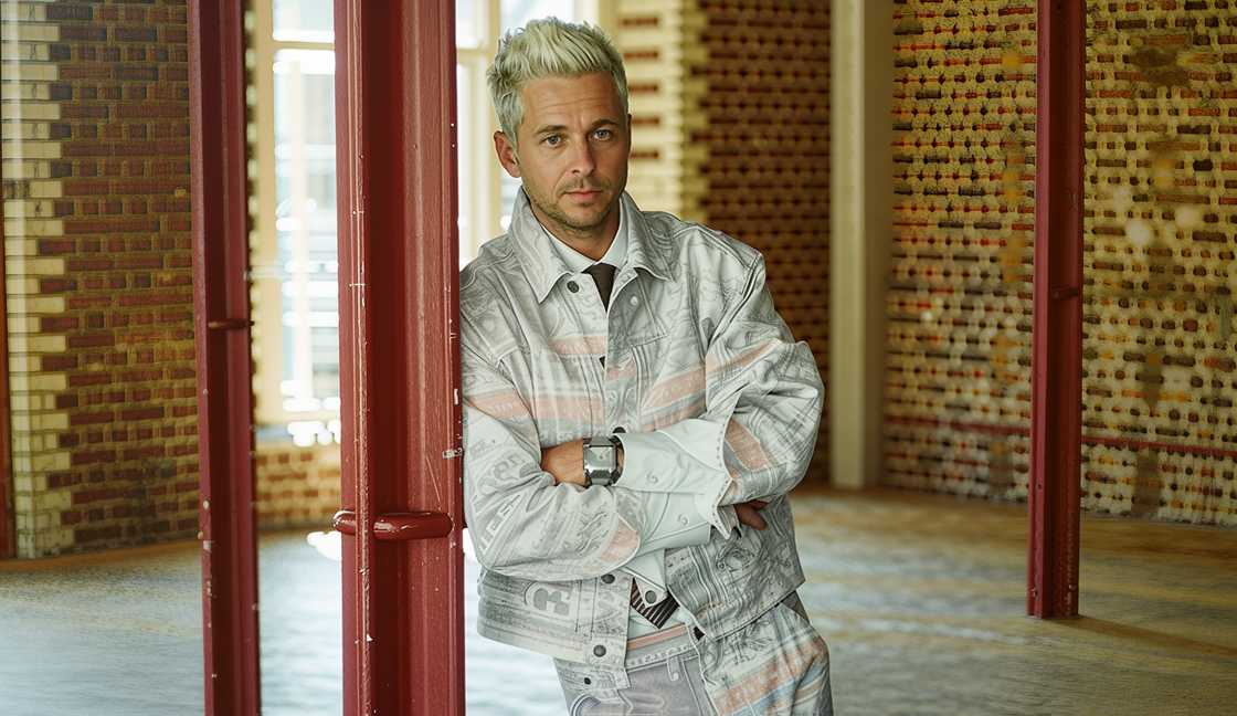 Ryan Tedder poses standing for the 1883 Magazine. Ryan Tedder poses standing for the 1883 Magazine.