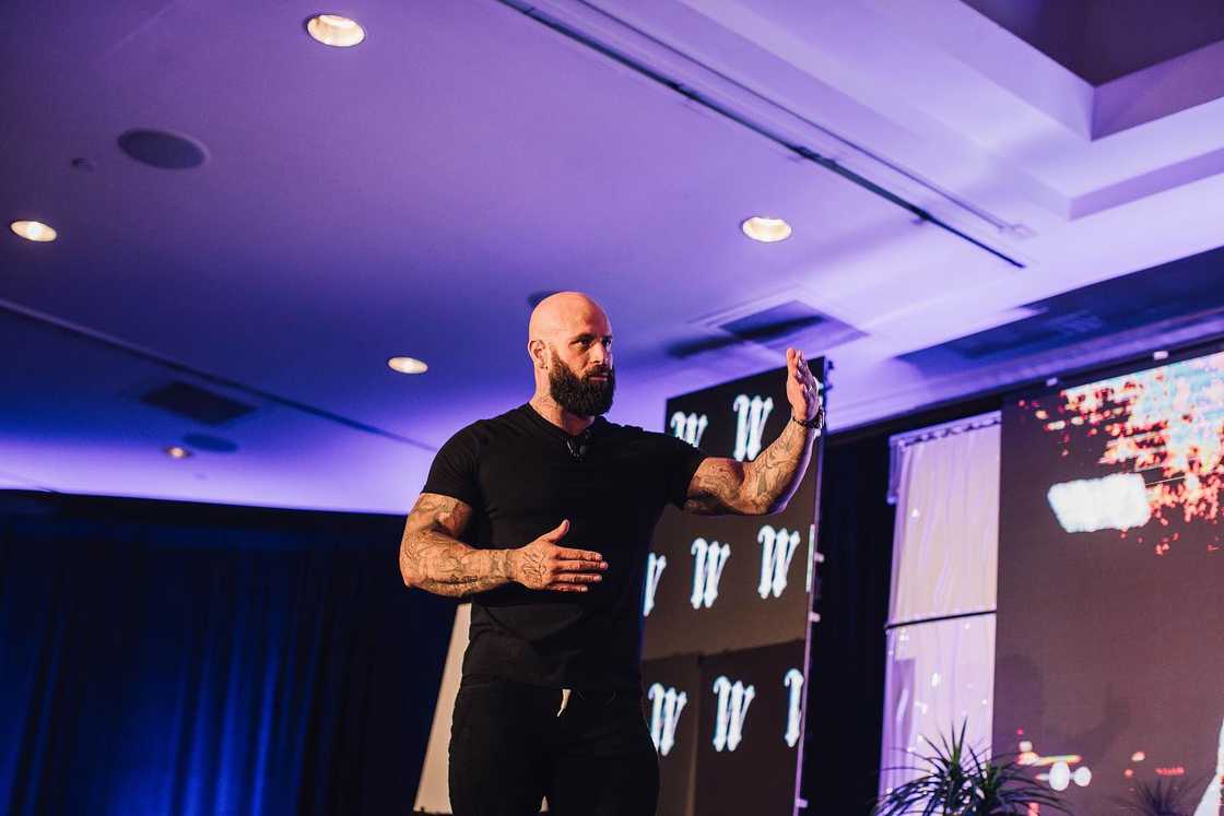 Wes Watson on stage at an event