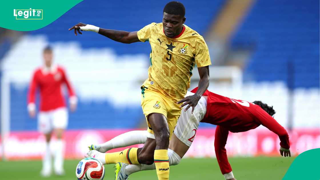 Josh Sheehan of Wales is challenged by Thomas Partey of Ghana during the international friendly match on June 02, 2026 in Cardiff, Wales. Photo by Ryan Hiscott