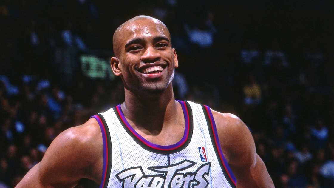 Vince Carter of the Toronto Raptors laughs during a game