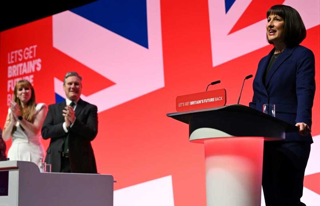 Labour's deputy leader Angela Rayner (L), leader Keir Starmer (C) and shadow finance minister Rachel Reeves