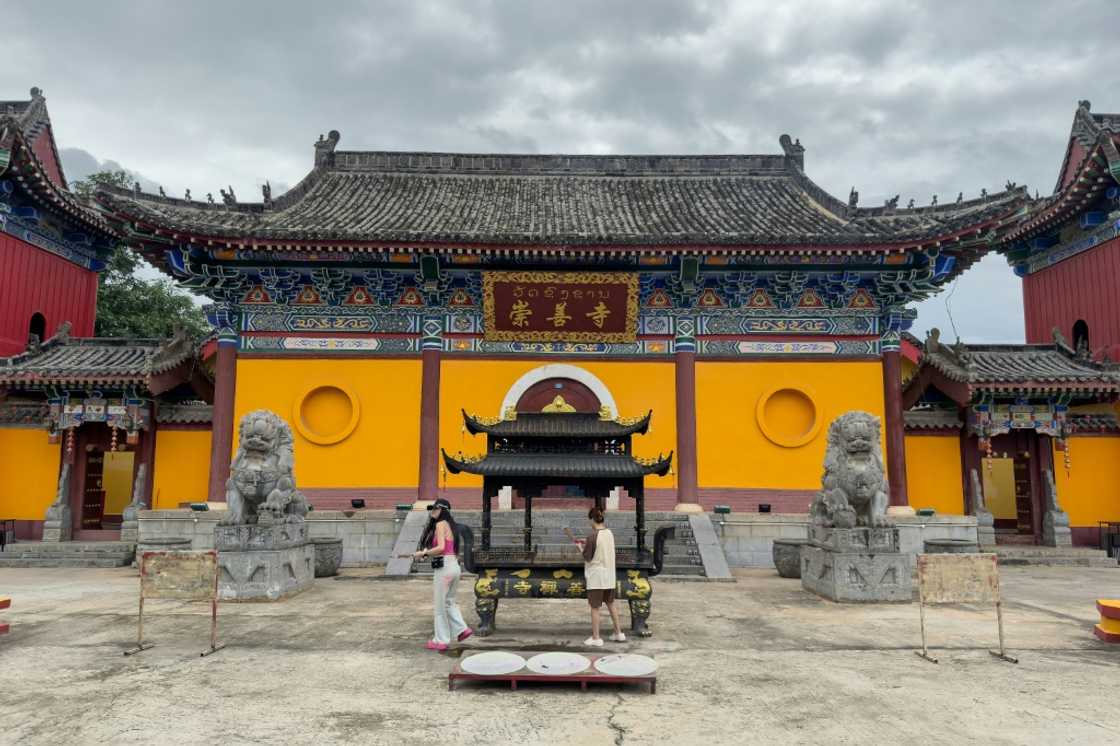 Traffic signs in the GTSEZ are in Chinese script, while everything from cigarettes to jade and fake Christian Dior bags are sold in China's yuan Traffic signs in the GTSEZ are in Chinese script, while everything from cigarettes to jade and fake Christian Dior bags are sold in China's yuan