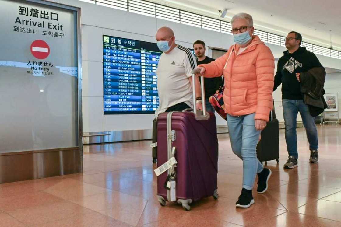 In Japan, tourists will find a country still adhering to many of the guidelines that helped it to keep pandemic deaths lower than many other developed nations, including masks In Japan, tourists will find a country still adhering to many of the guidelines that helped it to keep pandemic deaths lower than many other developed nations, including masks