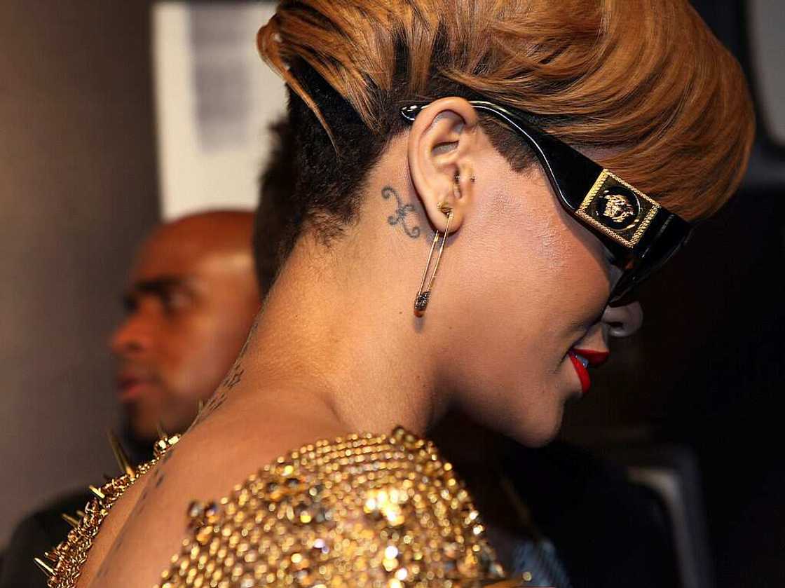 Rihanna neck's tattoos Rihanna neck's tattoos