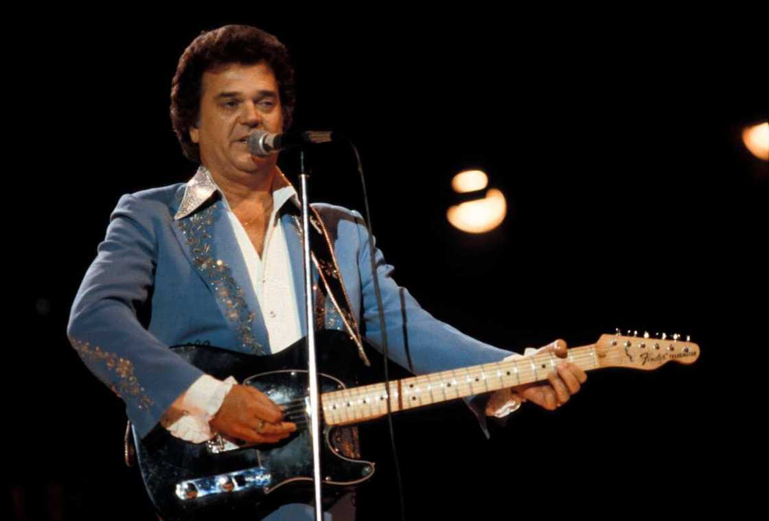 The late singer Conway Twitty perfoming on stage The late singer Conway Twitty perfoming on stage
