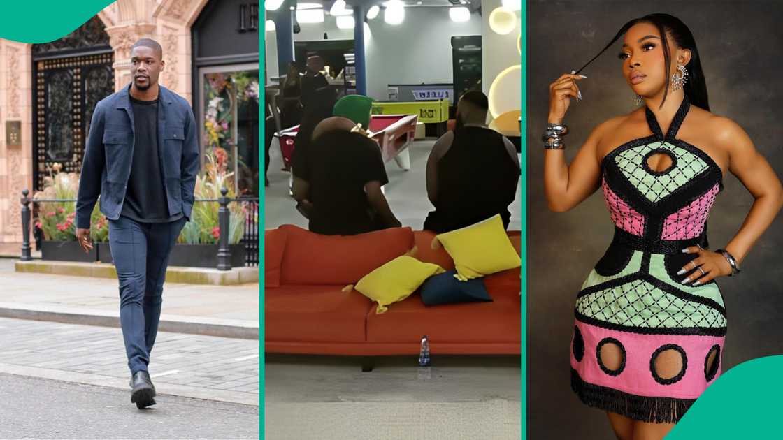 Toke Makinwa sits on Shauns legs. Toke Makinwa sits on Shauns legs.