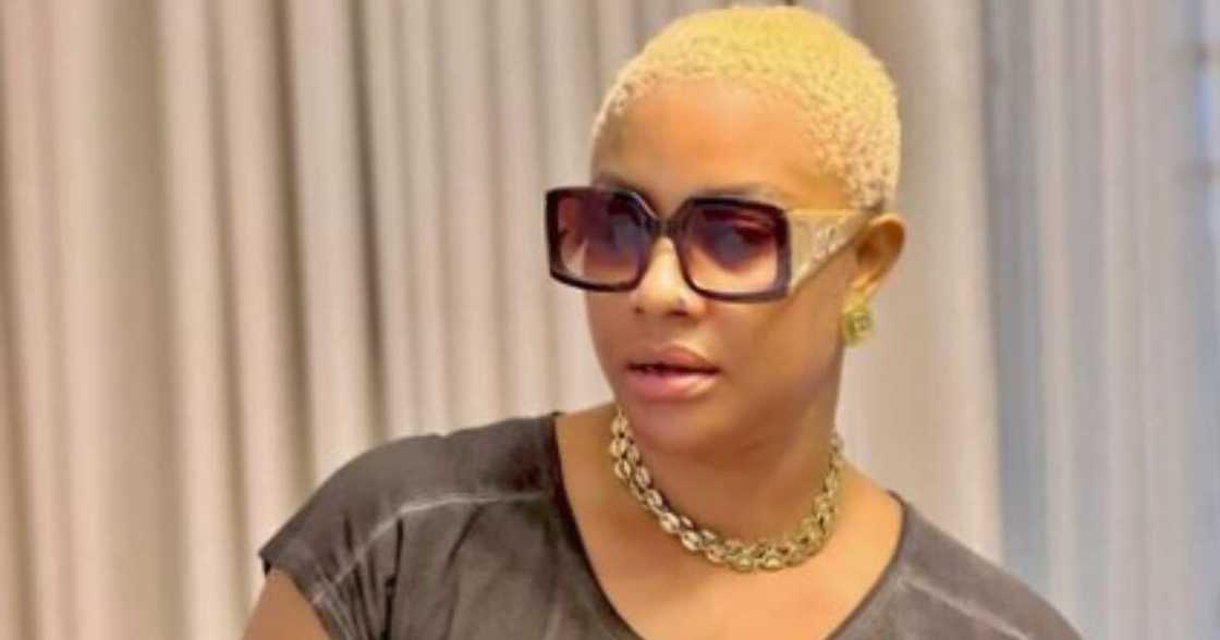 Actress Angela Okoria carries loaded gun, asks fans about church. Actress Angela Okoria carries loaded gun, asks fans about church.