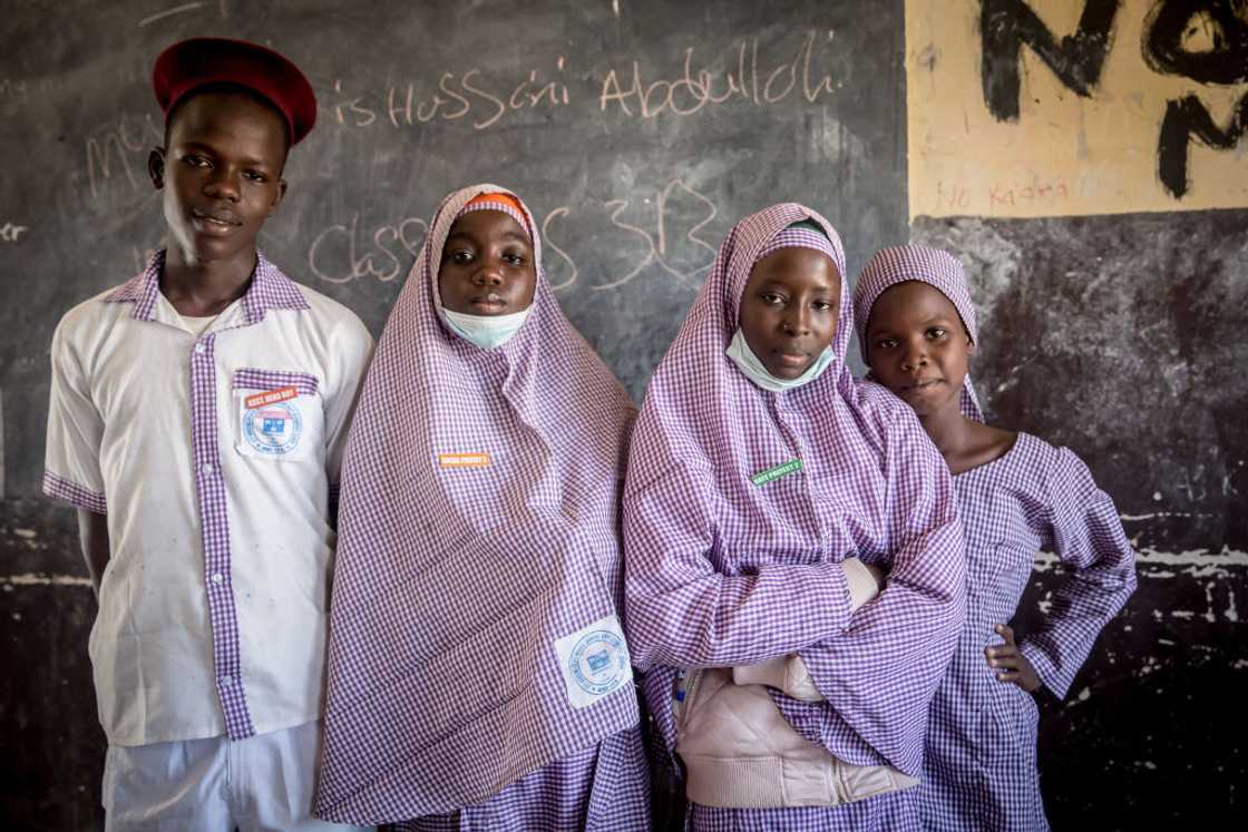 Nigerian students Mikail, Maryam, Amina and Hyeladzira, students of the 777 Junior secondary school are seen in the classroom