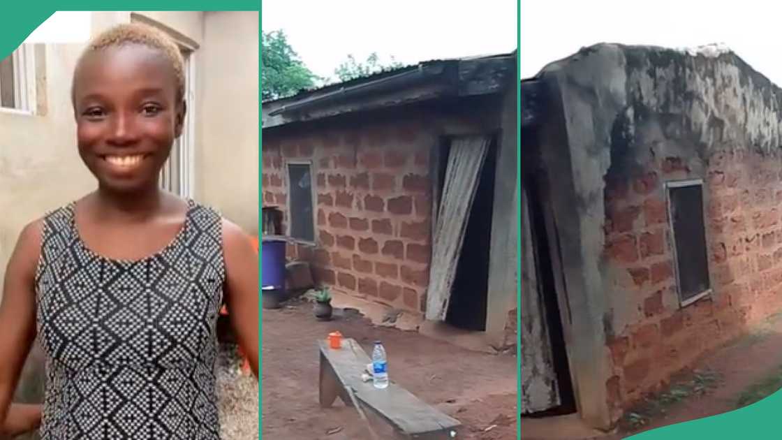 Lady shows people her family house in Kogi state.