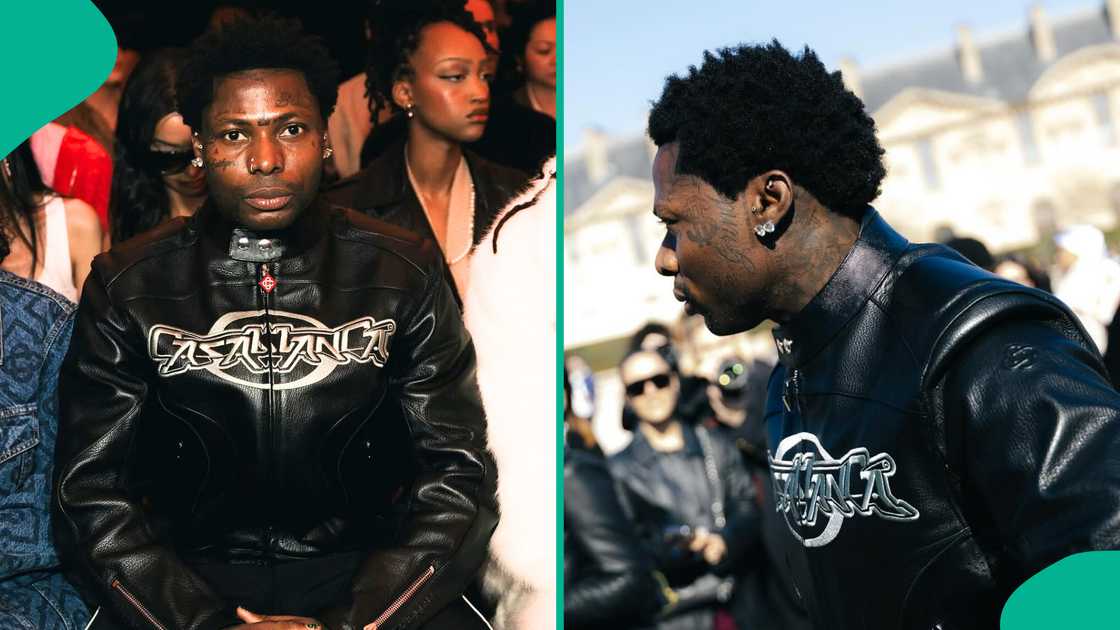 Asake rocks high heels at Paris Fashion Week. Asake rocks high heels at Paris Fashion Week.