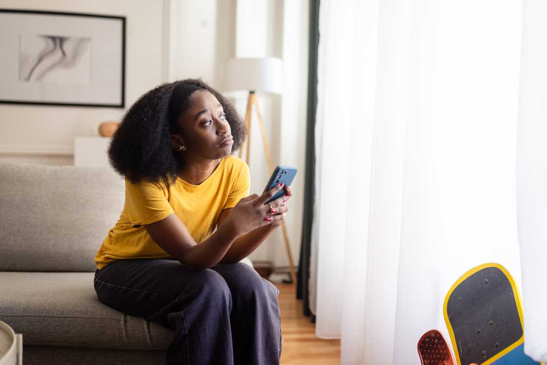 A woman on her phone A woman on her phone