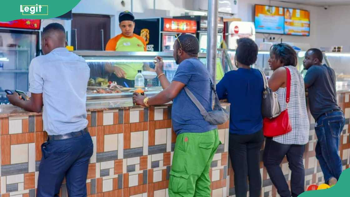 People buying at Ultima restaurant People buying at Ultima restaurant