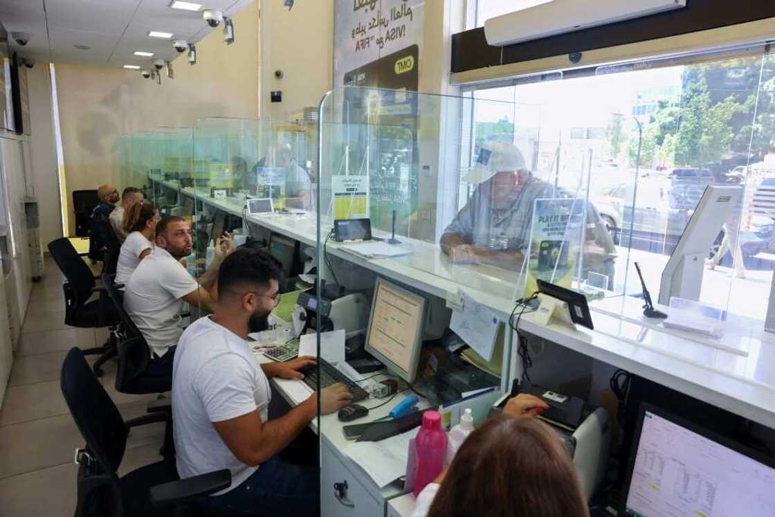 Money transfer agencies are filling the gap after Lebanon's banking sector has largely crumbled Money transfer agencies are filling the gap after Lebanon's banking sector has largely crumbled