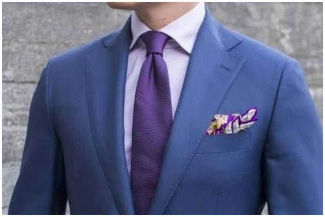Navy suit with a lilac shirt and a deep purple shirt Navy suit with a lilac shirt and a deep purple shirt