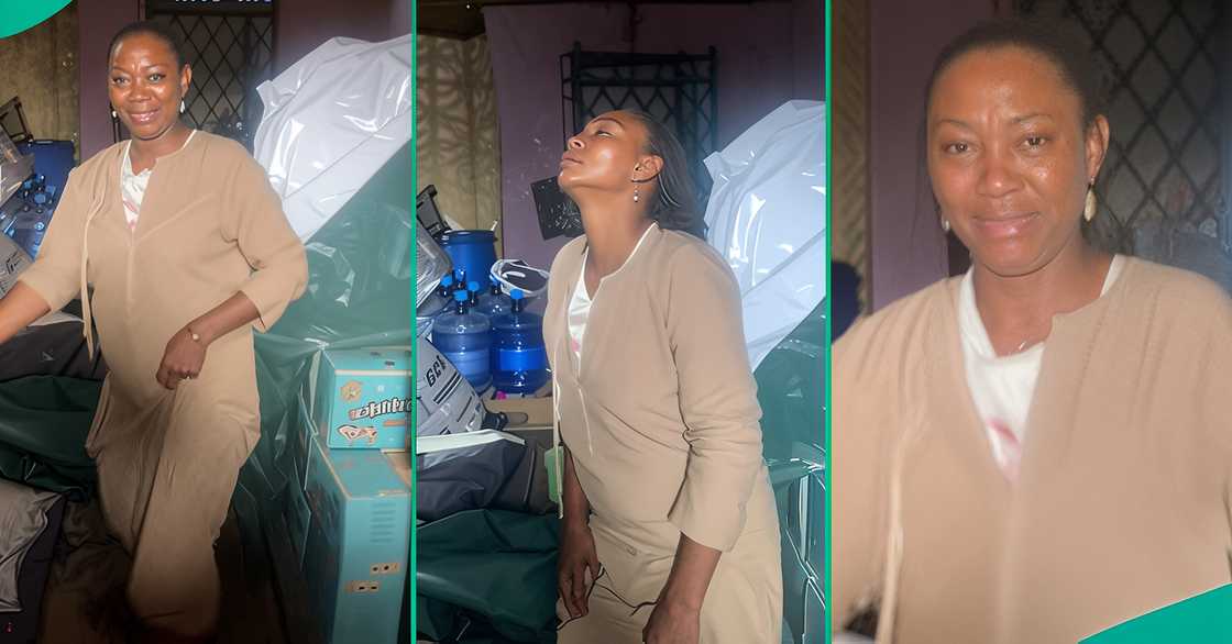 A businesswoman cries after her bags of rice were stolen from her shop. A businesswoman cries after her bags of rice were stolen from her shop.