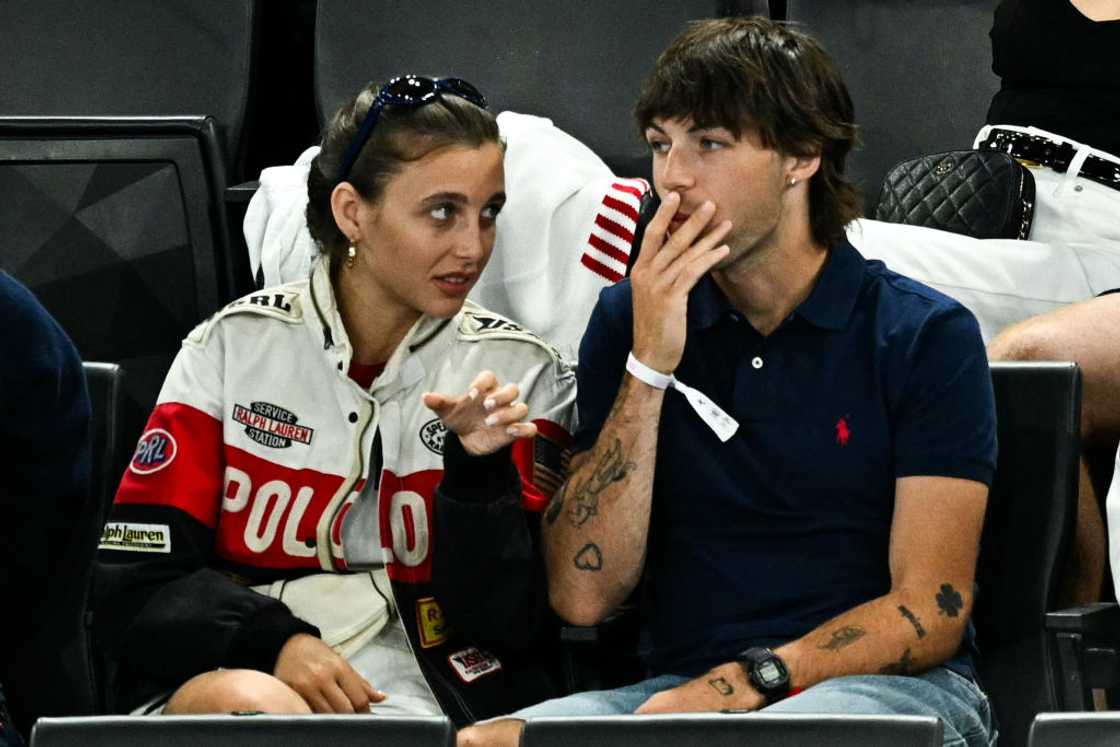 Emma Chamberlain and Peter McPoland at the Bercy Arena in Paris Emma Chamberlain and Peter McPoland at the Bercy Arena in Paris