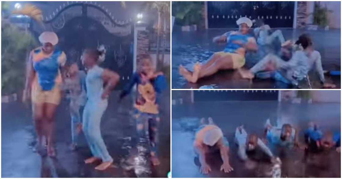 Mercy Johnson and kids play under the rain Mercy Johnson and kids play under the rain