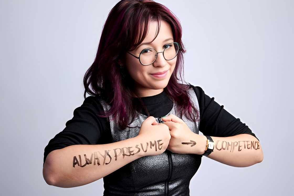 Dani Bowman poses with an advocacy message written on her arms Dani Bowman poses with an advocacy message written on her arms