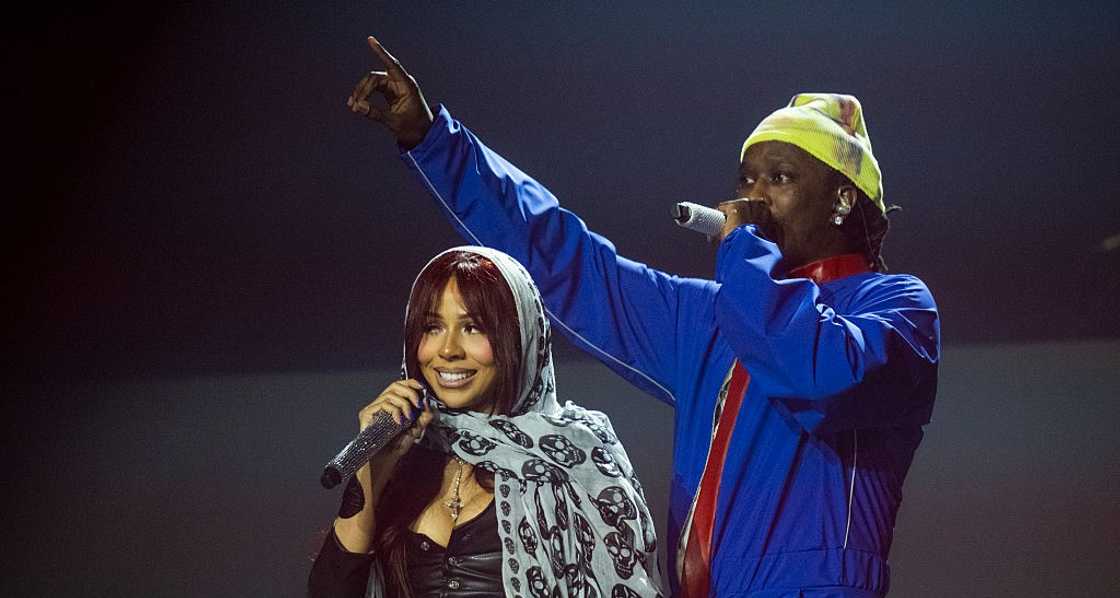 Mariah The Scientist and Young Thug perform at a concert