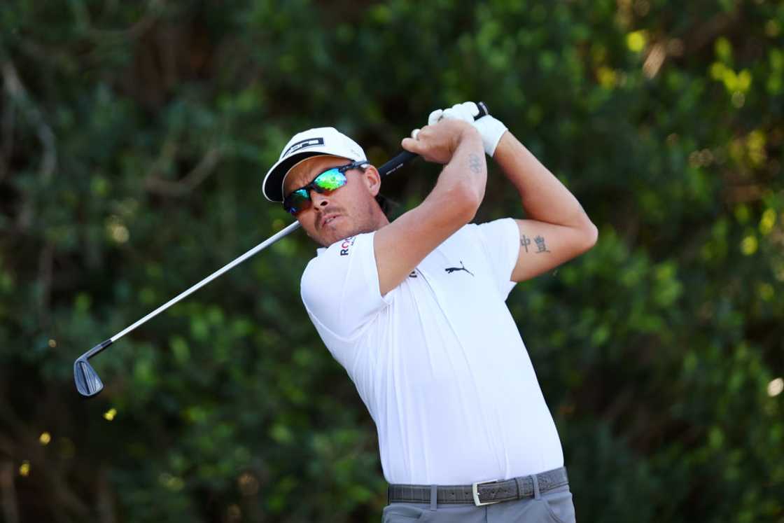 Rickie Fowler plays his shot Rickie Fowler plays his shot