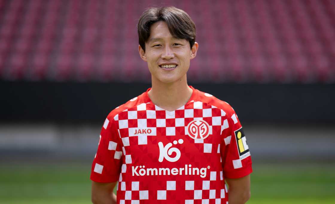 Lee Jae-sung poses standing during the team presentation at MEWA Arena Lee Jae-sung poses standing during the team presentation at MEWA Arena