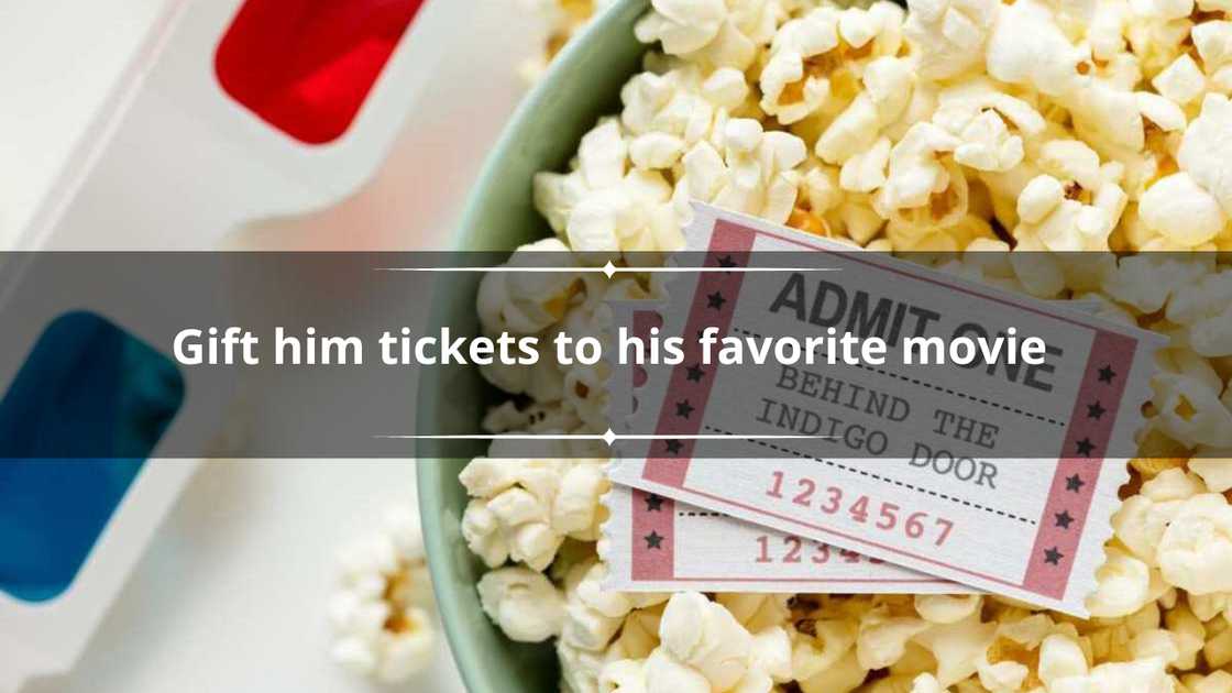 Movie tickets, 3D glasses and popcorn in a bucket Movie tickets, 3D glasses and popcorn in a bucket