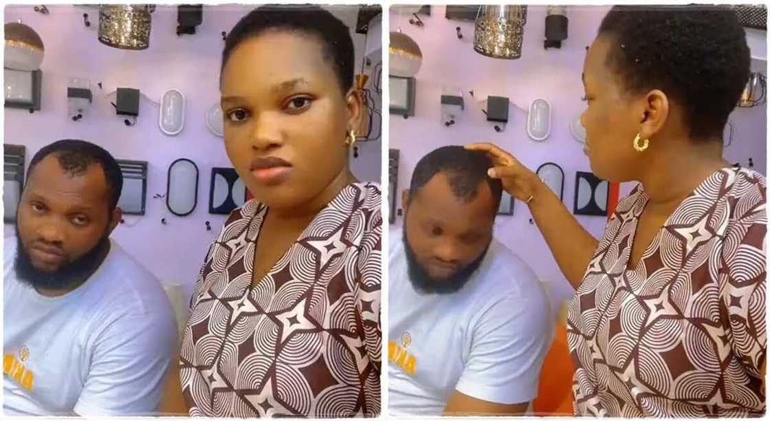 Lady shows off her husband's bald head. Lady shows off her husband's bald head.