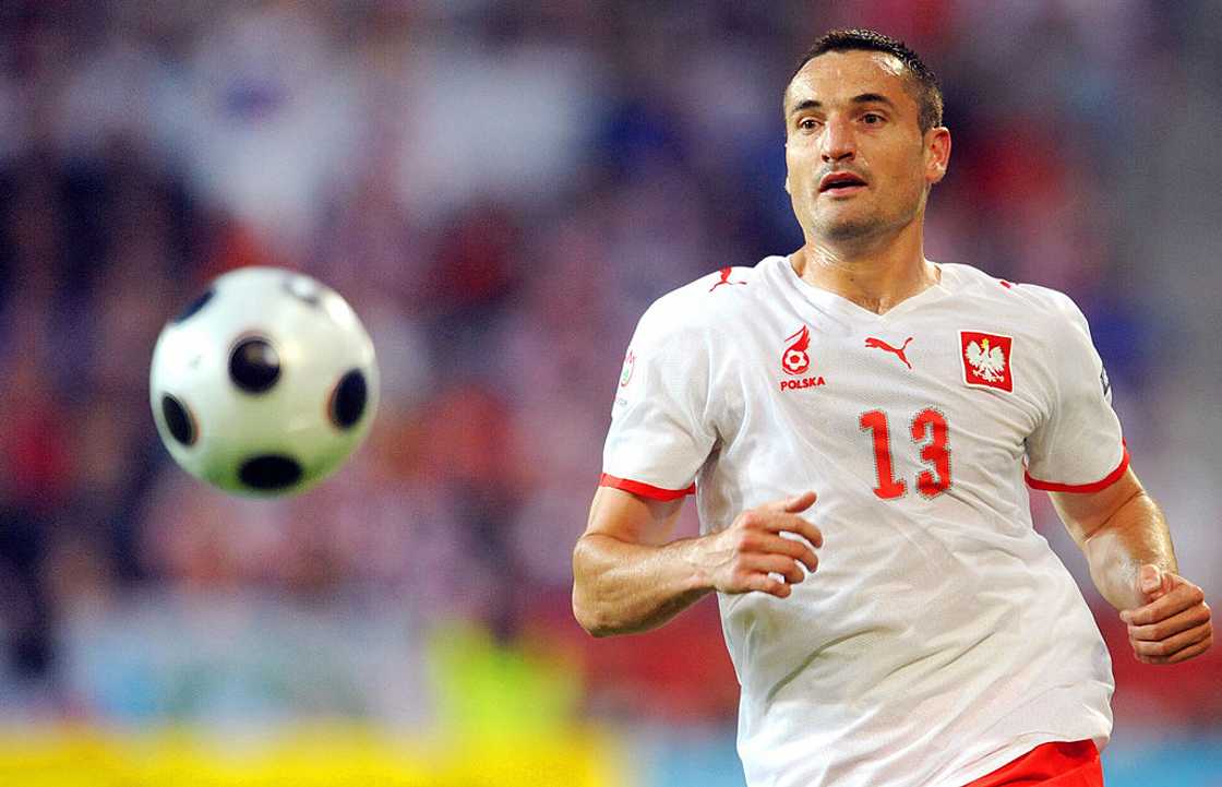 Polish defender Marcin Wasilewski running after a ball