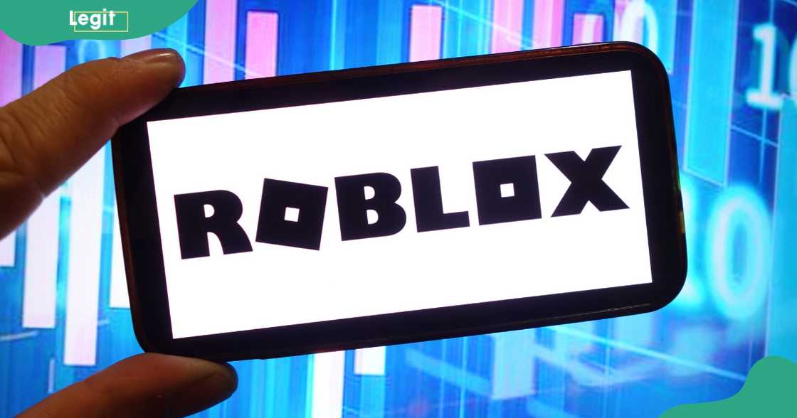 A screen showing the words Roblox. A screen showing the words Roblox.