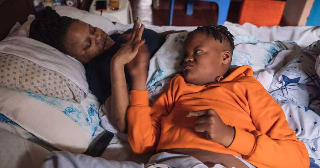 Charity Kitawa and her only son Luke. Charity Kitawa and her only son Luke.