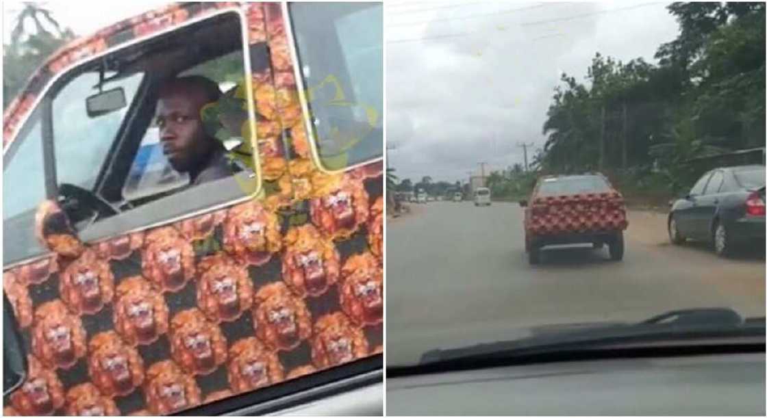 Nigerian man drives around in an Isi-Agu-themed car. Nigerian man drives around in an Isi-Agu-themed car.